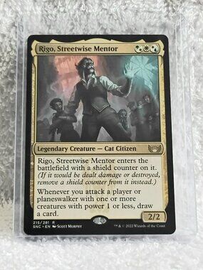 5/$20 Mint 2022 MTG Rigo, Streetwise Mentor Rare Card 215/281 Deckmaster!!
